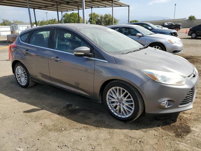 1FAHP3M25CL200781 - 2012 FORD FOCUS SEL GRAY photo 4