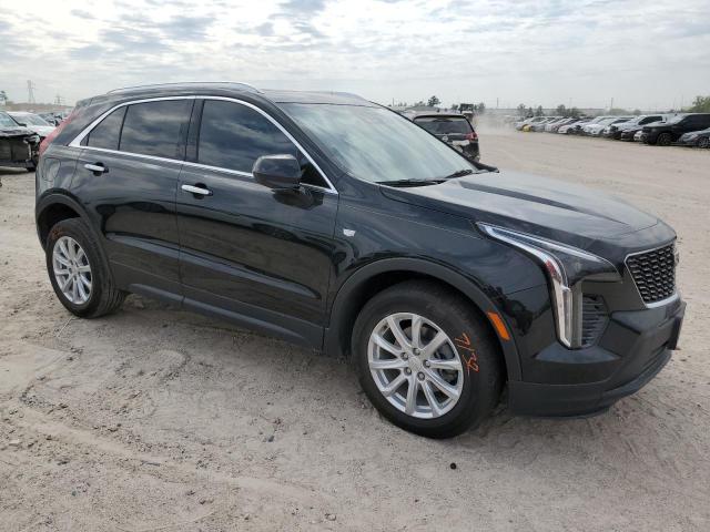 1GYAZAR45PF109268 - 2023 CADILLAC XT4 LUXURY BLACK photo 4