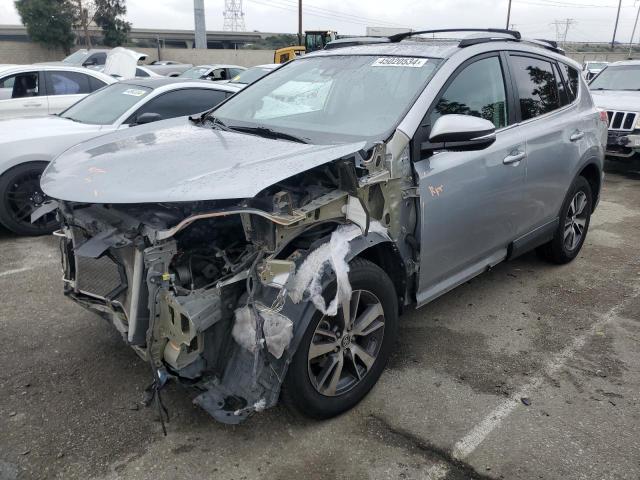 2T3RFREVXHW660259 - 2017 TOYOTA RAV4 XLE SILVER photo 1