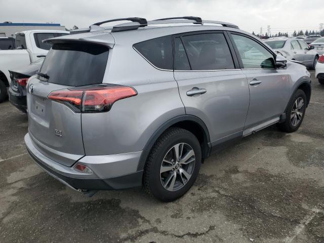 2T3RFREVXHW660259 - 2017 TOYOTA RAV4 XLE SILVER photo 3