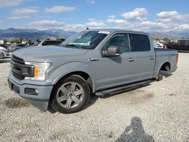 1FTEW1CP9KKC98722 - 2019 FORD F150 SUPERCREW GRAY photo 1