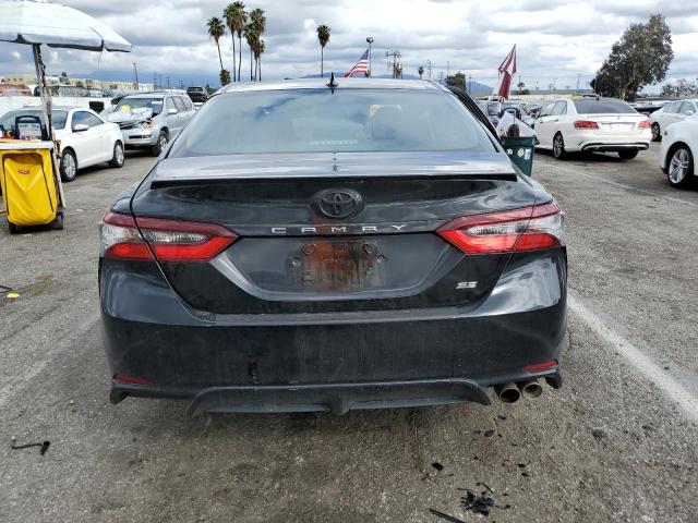 4T1T11AK0PU804703 - 2023 TOYOTA CAMRY SE NIGHT SHADE BLACK photo 6