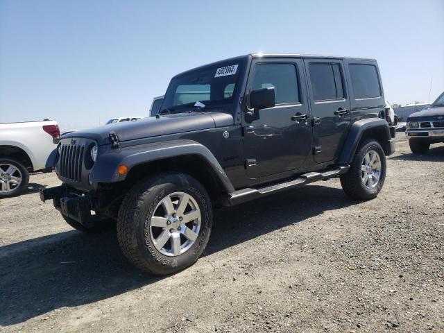 1C4HJWEG8JL894645 - 2018 JEEP WRANGLER U SAHARA GRAY photo 1