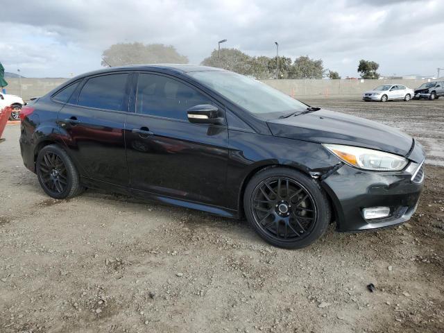 1FADP3F24FL292563 - 2015 FORD FOCUS SE BLACK photo 4