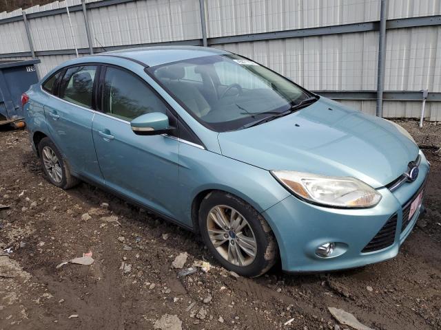 1FAHP3H2XCL197712 - 2012 FORD FOCUS SEL BLUE photo 4