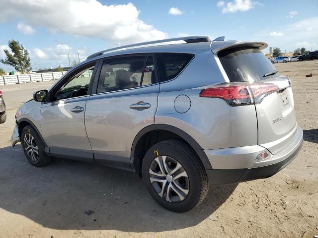 2T3ZFREV6JW505391 - 2018 TOYOTA RAV4 LE SILVER photo 2