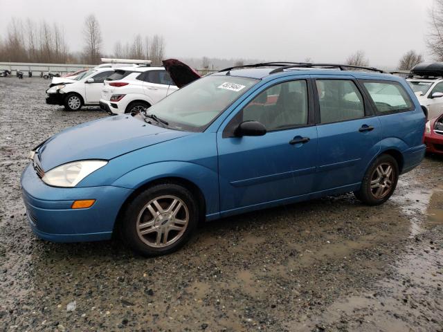 1FAHP36P8YW283234 - 2000 FORD FOCUS SE BLUE photo 1