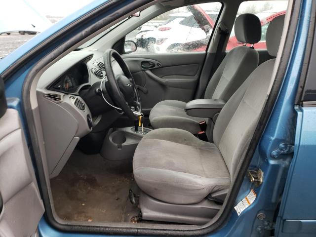 1FAHP36P8YW283234 - 2000 FORD FOCUS SE BLUE photo 7