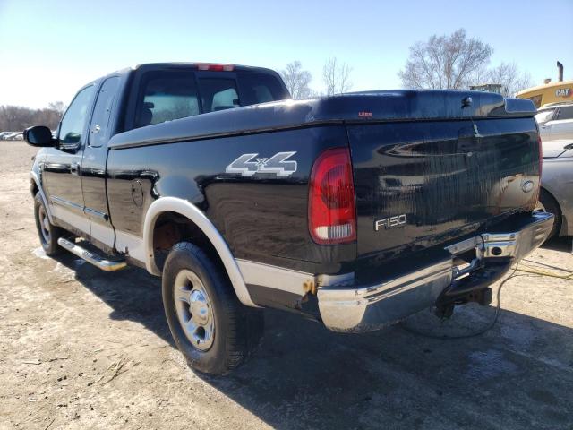 2FTRX18L72CA64975 - 2002 FORD F150 BLACK photo 2