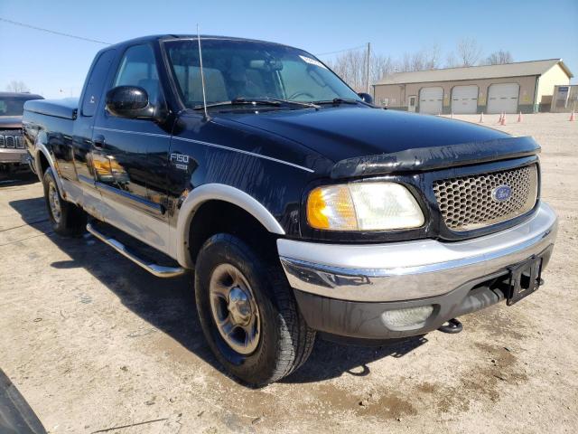 2FTRX18L72CA64975 - 2002 FORD F150 BLACK photo 4