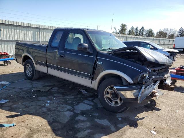 1FTDX176XVNC93736 - 1997 FORD F150 BLACK photo 4