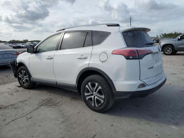 JTMZFREV4JJ728916 - 2018 TOYOTA RAV4 LE WHITE photo 2