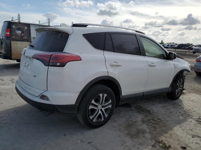 JTMZFREV4JJ728916 - 2018 TOYOTA RAV4 LE WHITE photo 3