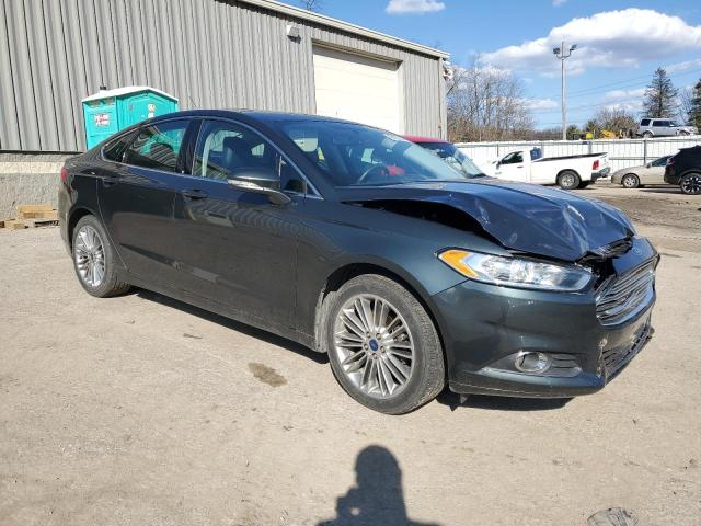 3FA6P0HD1FR125486 - 2015 FORD FUSION SE GREEN photo 4