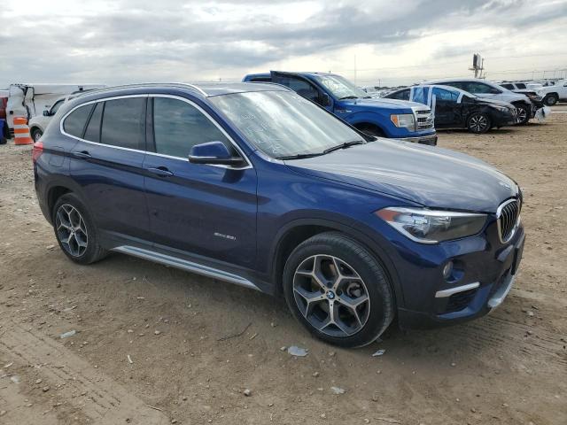 WBXHU7C38H5H34928 - 2017 BMW X1 SDRIVE28I BLUE photo 4