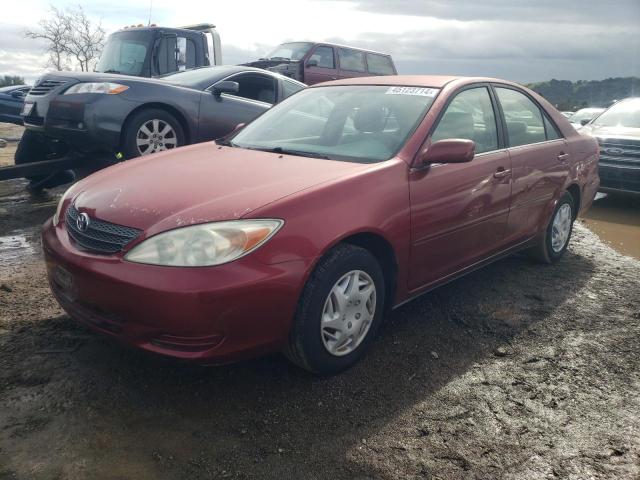 JTDBE32K520118932 - 2002 TOYOTA CAMRY LE RED photo 1