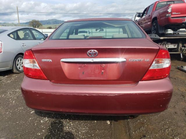 JTDBE32K520118932 - 2002 TOYOTA CAMRY LE RED photo 6