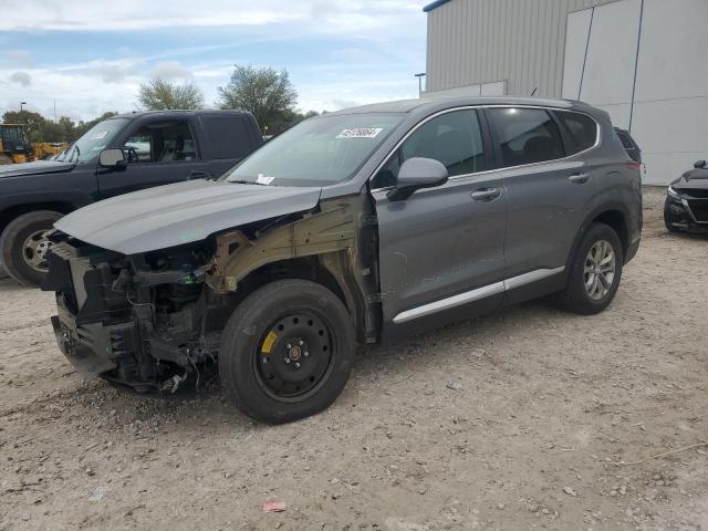 5NMS23AD7KH076601 - 2019 HYUNDAI SANTA FE SE GRAY photo 1