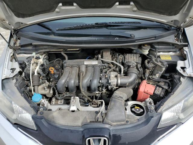 JHMGK5H75GX007310 - 2016 HONDA FIT EX SILVER photo 11