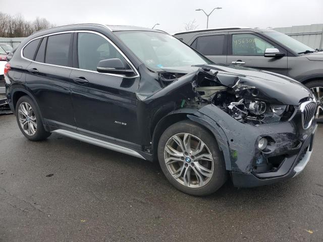 WBXHT3Z3XG4A51281 - 2016 BMW X1 XDRIVE28I BLACK photo 4