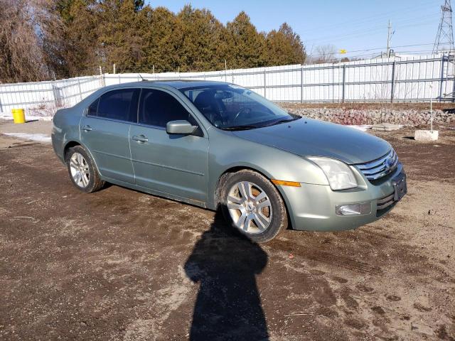 3FAHP08Z99R158891 - 2009 FORD FUSION SEL GRAY photo 4