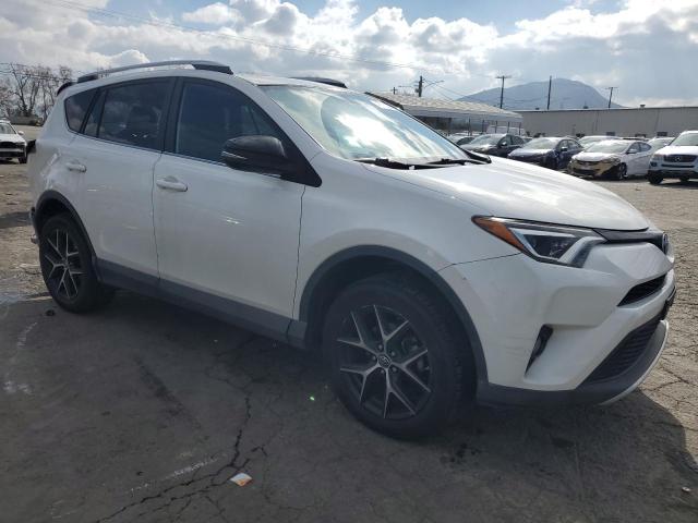 2T3NFREV3GW301171 - 2016 TOYOTA RAV4 SE WHITE photo 4