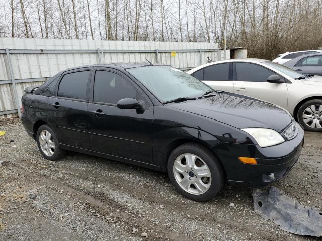 1FAHP38Z07W229987 - 2007 FORD FOCUS ST BLACK photo 4