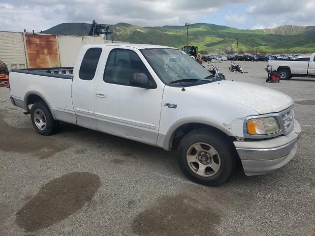 1FTRX17L3XKA33128 - 1999 FORD F150 WHITE photo 4