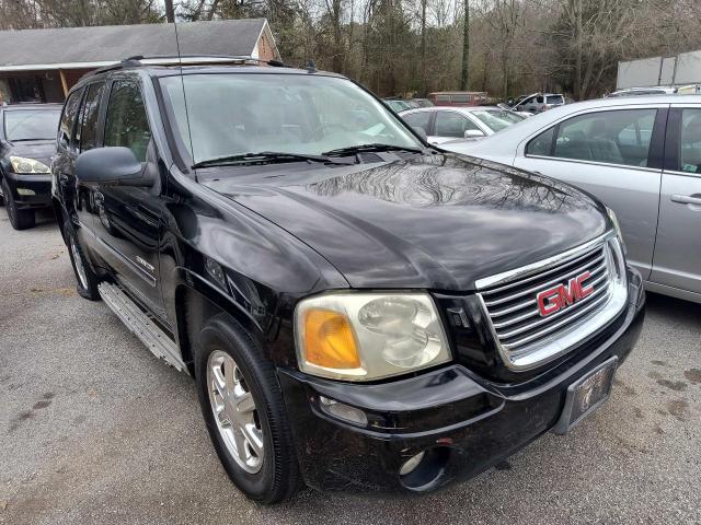 1GKDT13S762286099 - 2007 GMC ENVOY BLACK photo 1