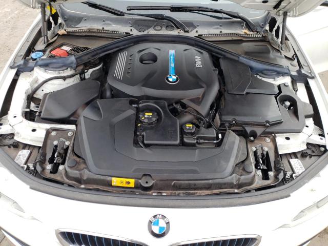 WBA8E1C56JA758368 - 2018 BMW 330E WHITE photo 11