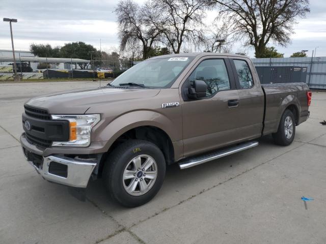 1FTEX1CB2JKF05404 - 2018 FORD F150 SUPER CAB TAN photo 1