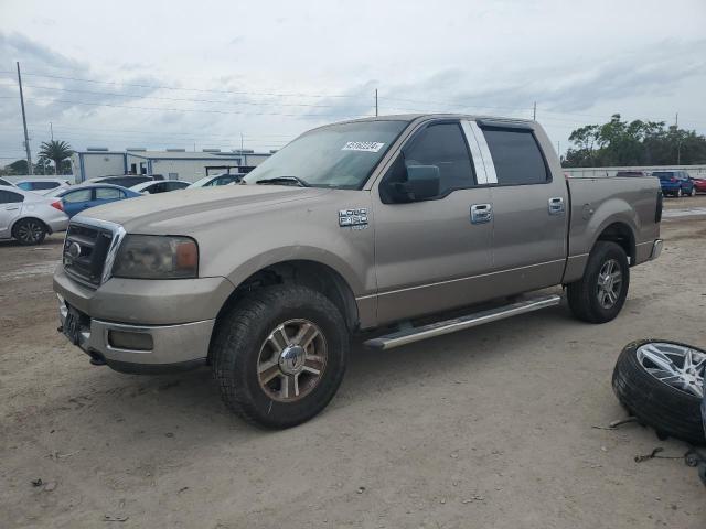 1FTRW14W24KC05937 - 2004 FORD F150 SUPERCREW GOLD photo 1