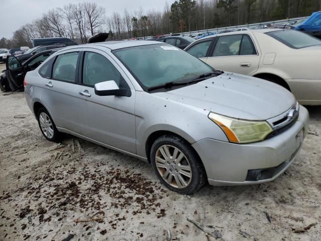 1FAHP3HN0AW158892 - 2010 FORD FOCUS SEL SILVER photo 4