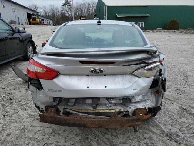 1FAHP3F22CL296866 - 2012 FORD FOCUS SE SILVER photo 6