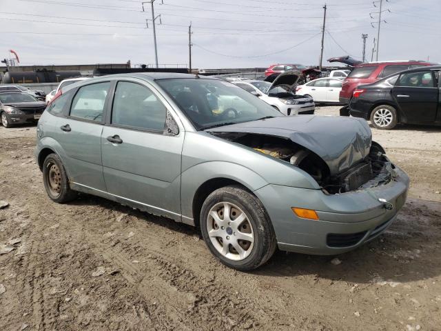 3FAFP37N25R121330 - 2005 FORD FOCUS ZX5 TEAL photo 4