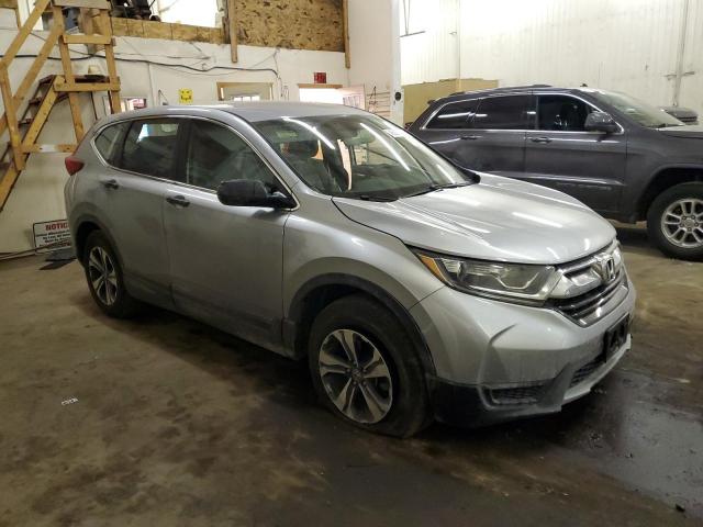 2HKRW6H36KH225701 - 2019 HONDA CR-V LX SILVER photo 4