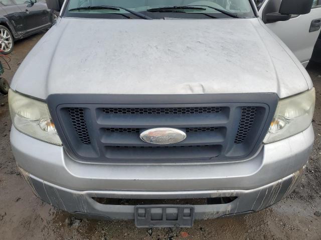 1FTRF12296NA66701 - 2006 FORD F150 SILVER photo 11