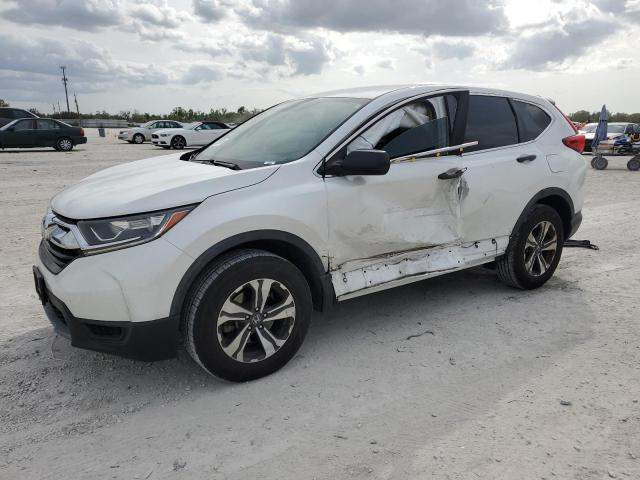 5J6RW6H31KL003881 - 2019 HONDA CR-V LX WHITE photo 1