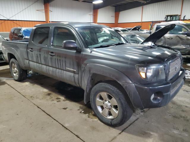 5TEMU52N09Z593982 - 2009 TOYOTA TACOMA DOUBLE CAB LONG BED GRAY photo 4