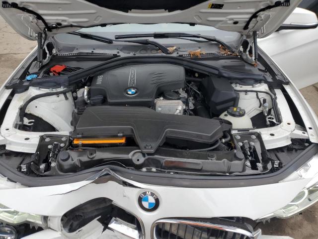 WBA8E5G56JNU46142 - 2018 BMW 320 XI WHITE photo 11