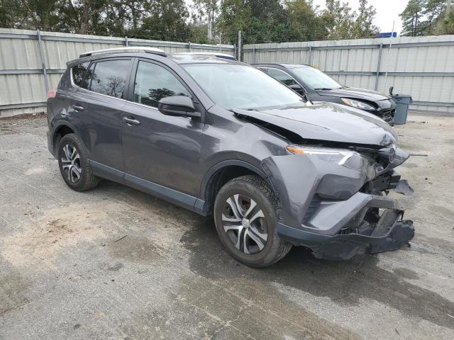 JTMZFREV4GJ098811 - 2016 TOYOTA RAV4 LE CHARCOAL photo 4