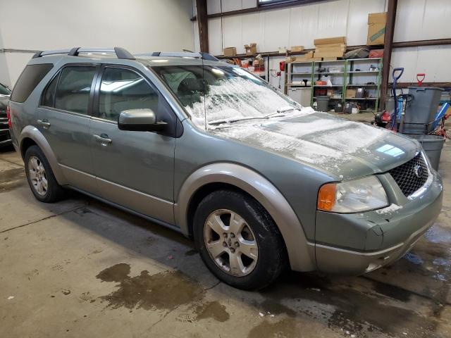 1FMDK05195GA27091 - 2005 FORD FREESTYLE SEL GREEN photo 4