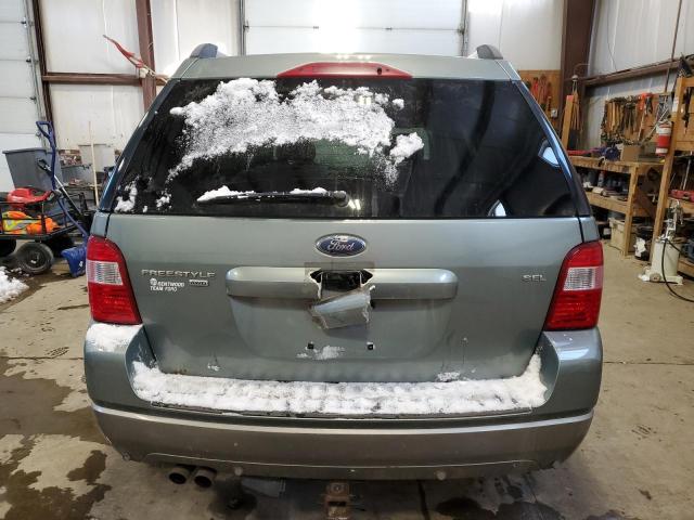 1FMDK05195GA27091 - 2005 FORD FREESTYLE SEL GREEN photo 6