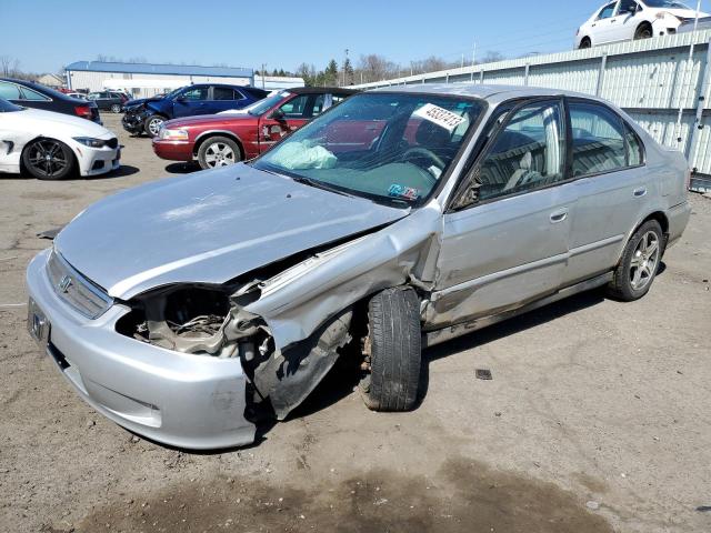 2HGEJ6616XH543446 - 1999 HONDA CIVIC BASE GRAY photo 1