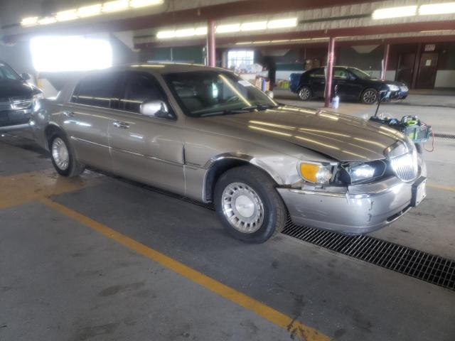 1LNHM81WX1Y710773 - 2001 LINCOLN TOWN CAR EXECUTIVE TAN photo 4