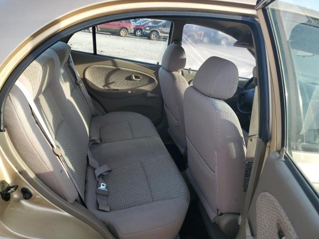 KNADC123626127208 - 2002 KIA RIO GOLD photo 10