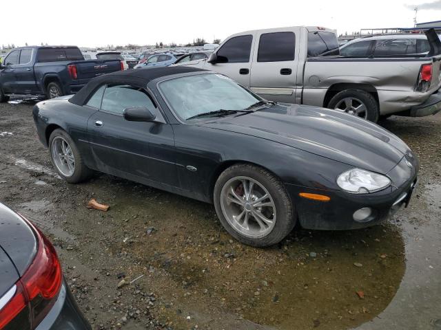 SAJDA42C12NA23956 - 2002 JAGUAR XK8 BLACK photo 4