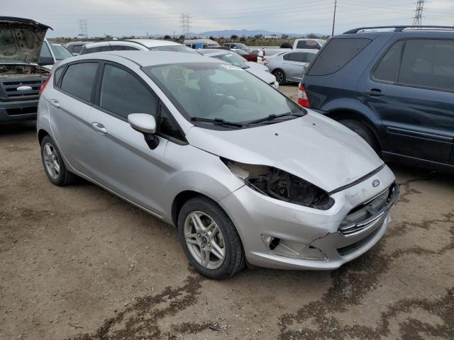 3FADP4EJ1JM123879 - 2018 FORD FIESTA SE SILVER photo 4