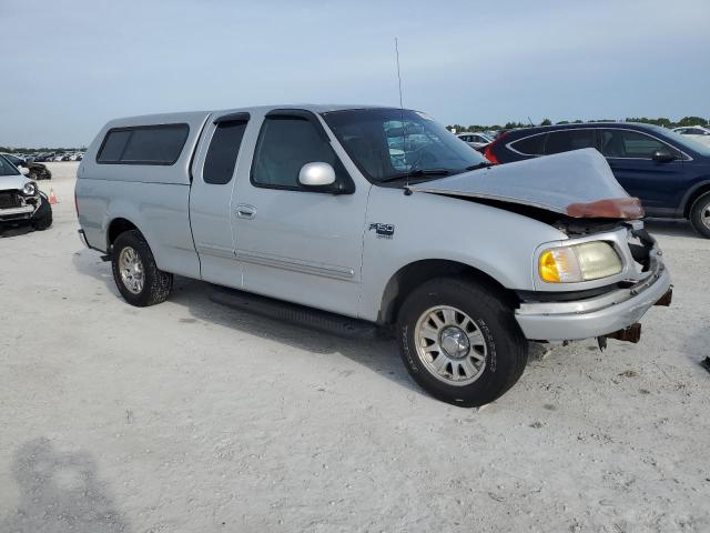 1FTRX17W82NB74200 - 2002 FORD F150 SILVER photo 4