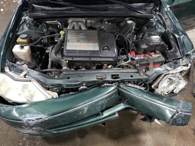 4T1BF28B22U210275 - 2002 TOYOTA AVALON XL GREEN photo 11